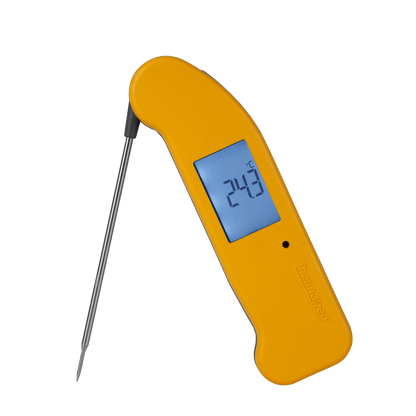 un thermomètre numérique Thermapen® One jaune sur fond noir de Thermometre.fr.