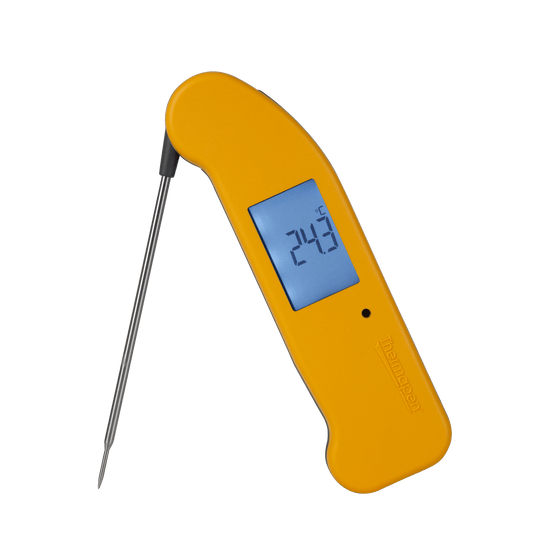 un thermomètre numérique Thermapen® One jaune sur fond noir de Thermometre.fr.